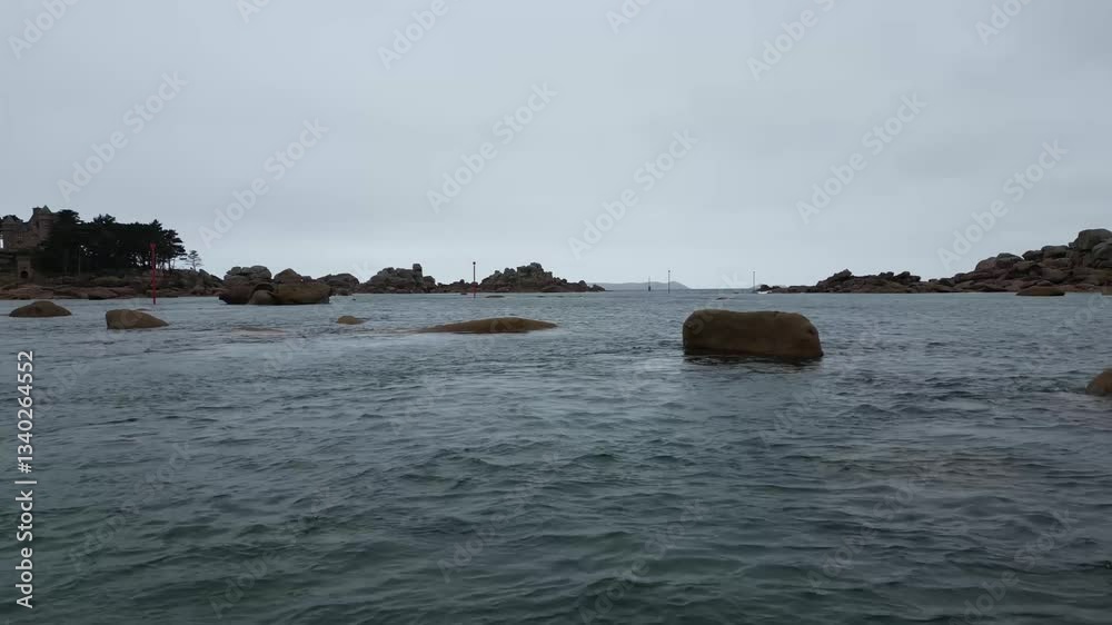 Low-level flight over the sea in a rocky area on the Brittany coast - Vol à basse altitude au dessus de la mer dans une zone rocheuse de la côte Bretonne