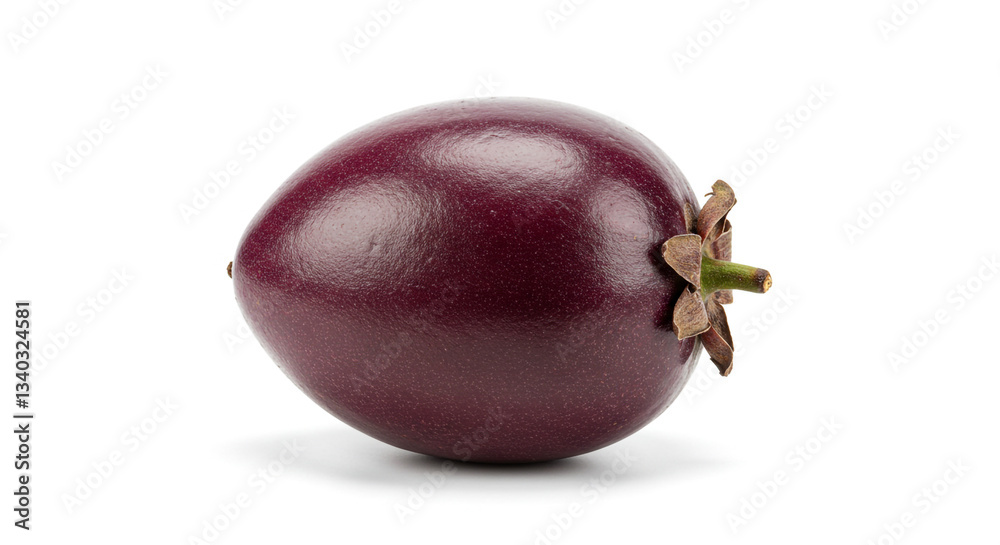A ripe tamarillo with smooth, deep purple skin and a glossy texture, isolated on a white background. This exotic fruit is known for its tangy-sweet flavor and rich nutritional benefits. A ripe tamarillo with smooth, deep purple skin and a glossy texture, isolated on a white background. This exotic fruit is known for its tangy-sweet flavor and rich nutritional benefits.