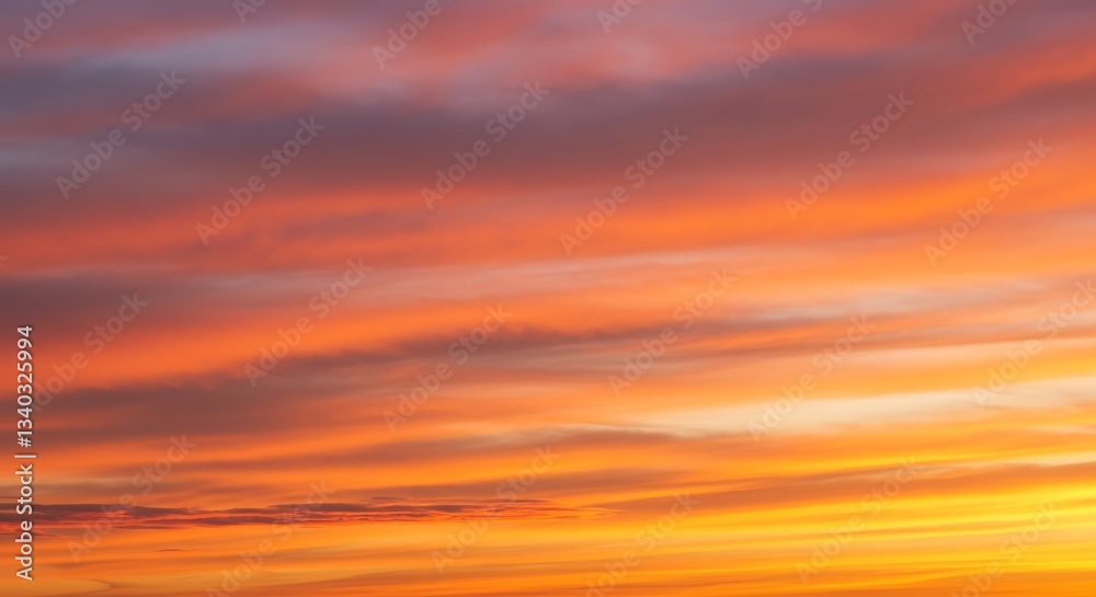 Fototapeta premium Vibrant Sunset Sky with Orange and Purple Clouds at Dusk
