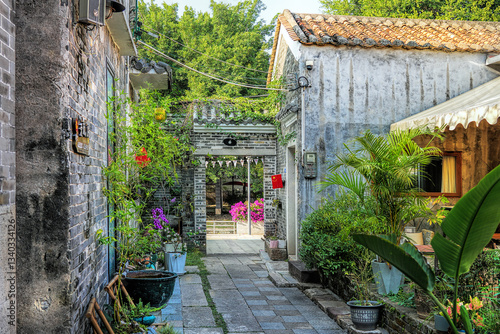 Foshan city, Guangdong, China. Nanhai Shishan Huangxi Village with a history of 800 years preserves various types of ancient buildings in the Lingnan style, traditional wood and brick carving. photo