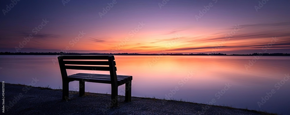 Lakeside sunset landscapes idea. A serene bench overlooking a calm lake at sunset, perfect for relaxation and reflection. Lakeside sunset landscapes idea. A serene bench overlooking a calm lake at sunset, perfect for relaxation and reflection.