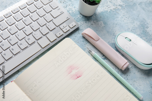 Notebook with lipstick kiss...