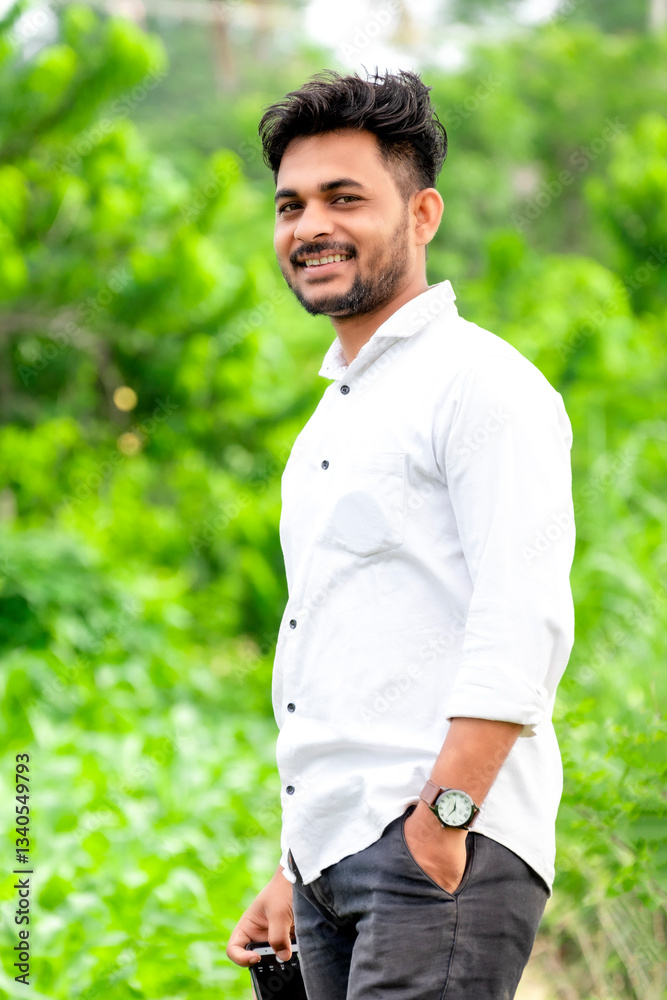 Stylish teenage man. looking to camera, close up, feeling happy smiling, candid portrait Stylish teenage man. looking to camera, close up, feeling happy smiling, candid portrait