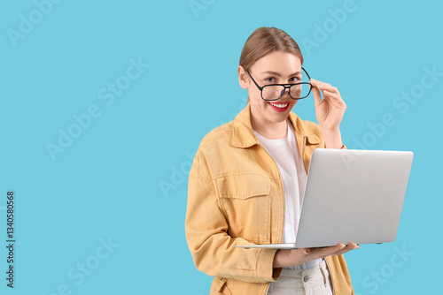 Female programmer with eyeg...