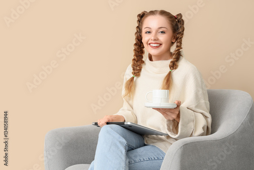 Happy young woman with cup ...