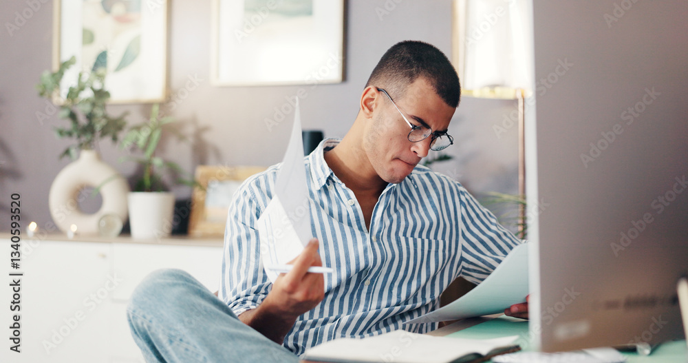 Naklejka premium Man, documents and computer in home with finance, planning and review debt for bills, budget or payment. Person, paperwork and check statement for balance, investment or saving with tax compliance