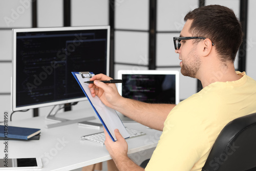 Portrait of male programmer...