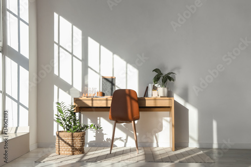 Modern workplace with books...