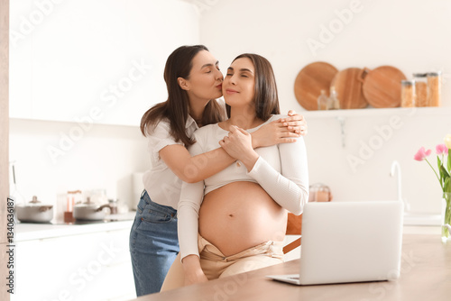 Young lesbian woman hugging...