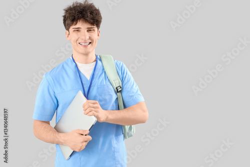 Male medical intern with la...