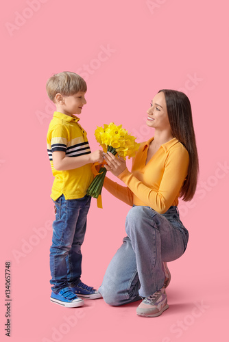 Young boy giving mother a b...