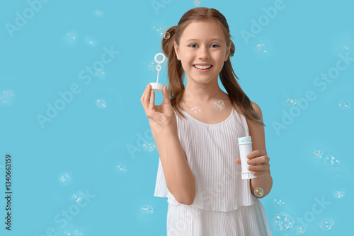 Cute girl with soap bubbles...