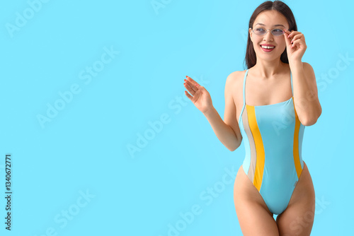 Young Asian woman in swimsu...