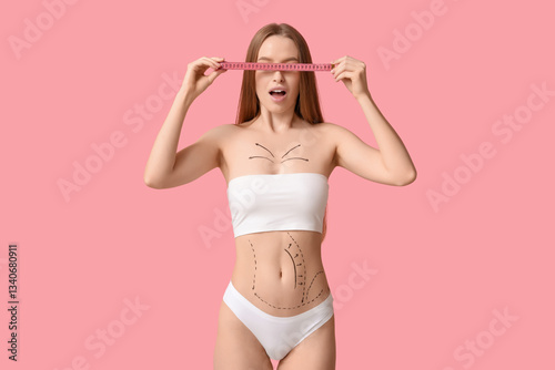 Shocked young woman with ma...