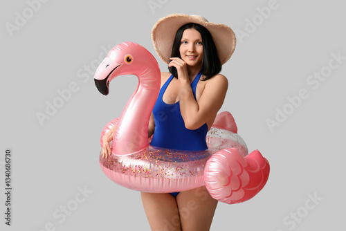 Beautiful young woman in st...