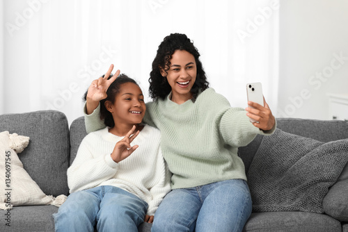 Happy mother and daughter t...