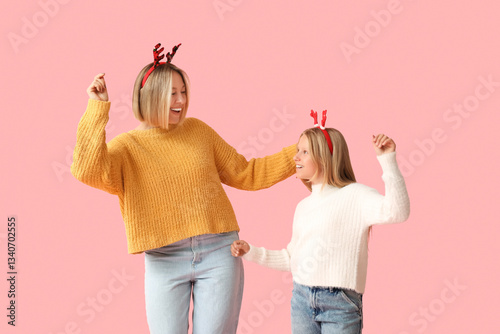 Joyful mother and daughter ...