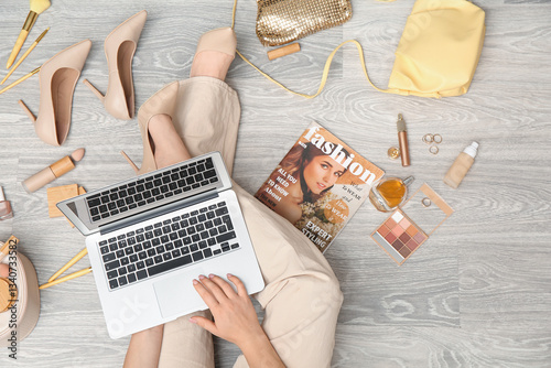 Woman with modern laptop, d...