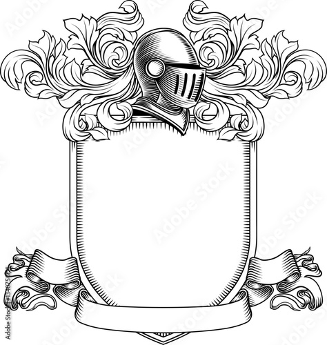 Coat of arms crest knight family medieval shield heraldry heraldic armorial motif. Featuring a knights helm helmet in a vintage etching engraving woodcut style