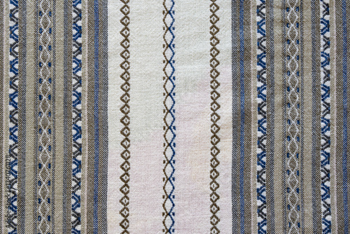 Background of white and gray natural linen handmade fabric with texture and simple pattern