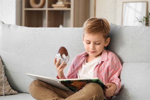 Little boy with chocolate e...