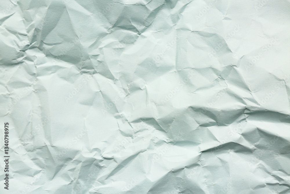 Obraz premium Texture of crumpled blue paper as background