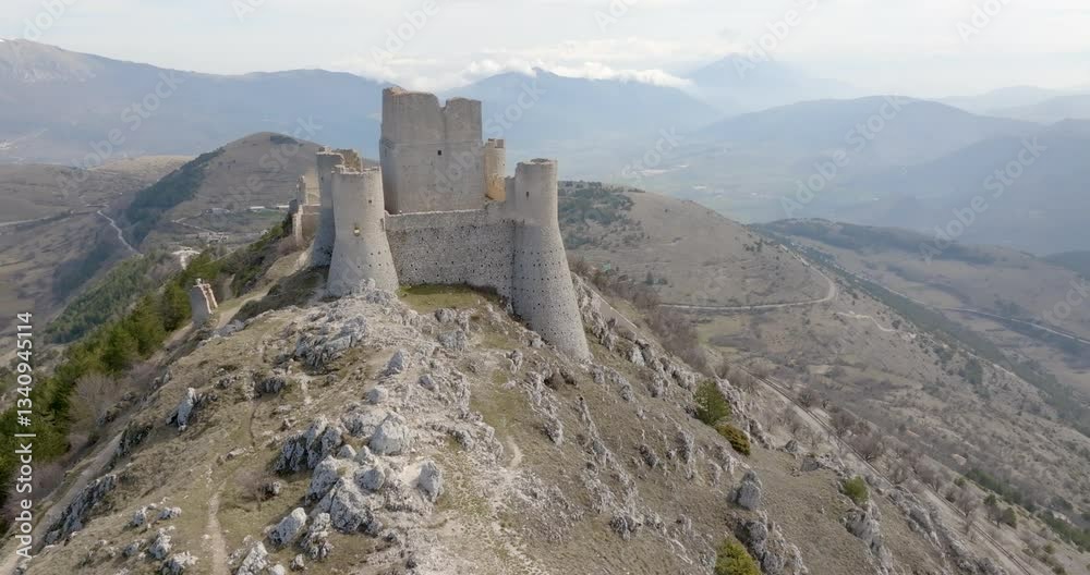 Aerial view of the castle of Rocca Calascio, a fortress located in Italy, in the municipality of Calascio. The castle, of which there are some archaeological remains, is one of the symbols of Abruzzo. Aerial view of the castle of Rocca Calascio, a fortress located in Italy, in the municipality of Calascio. The castle, of which there are some archaeological remains, is one of the symbols of Abruzzo.