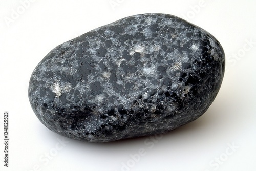 Smooth, dark gray stone with speckled white