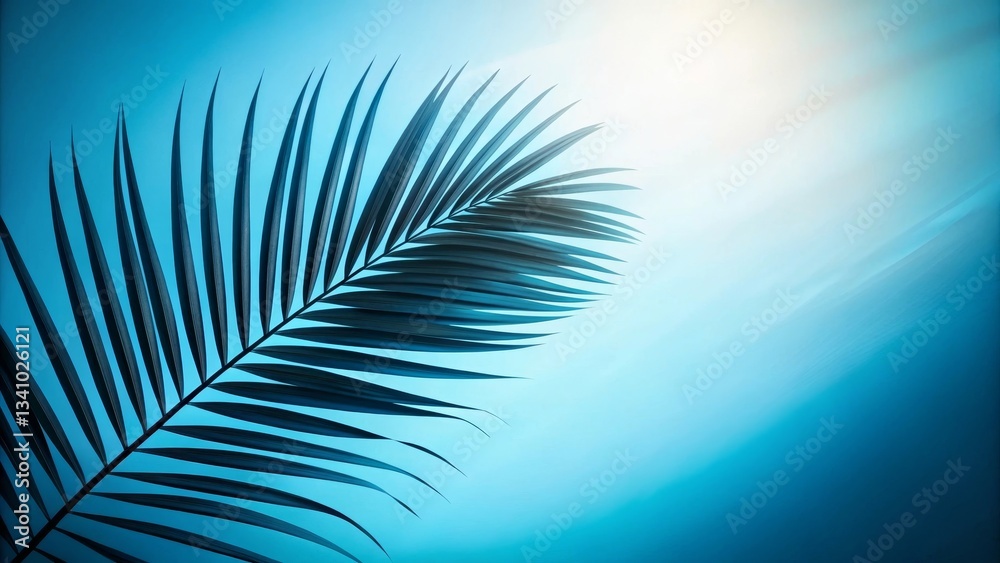 Obraz premium A sleek silhouette of a palm frond with elongated leaves set against a smooth blue gradient background. The clean lines and minimalist design create a serene, tropical aesthetic with ample copy space