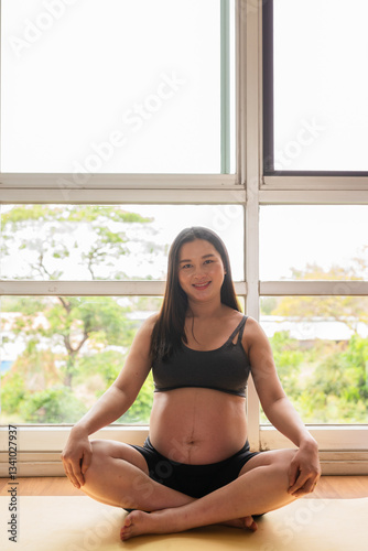 Pregnant woman doing yoga in gym Free Download Pregnant woman doing yoga in gym - GFXLoad