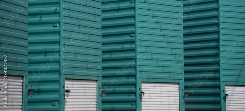 metal container on end or upright painted turquoise with white metal garage door and exterior light creative ways to use containers horizontal image room for type Base 31 Prince Edward County Ontario