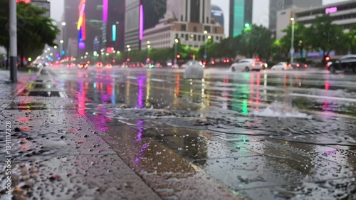 Urban Rhythm: Rain-Soaked Cityscape