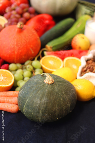 Obraz na płótnie Various healthy fruits, vegetables and cereals on dark background. Selective focus. w salonie