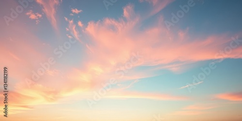 Soft pastel pink sunset sky panorama, light airy clouds, fluffy, vibrant