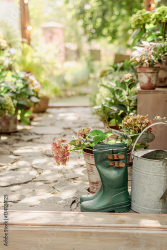 Green rubber boots for gardening.