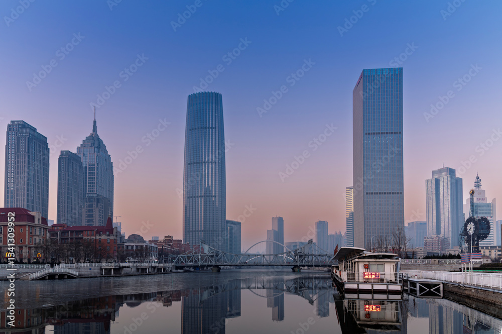 Naklejka premium sunset waterfront downtown skyline with Tianjin high-rise building cityscape at Haihe riverside, , Tianjin city, China