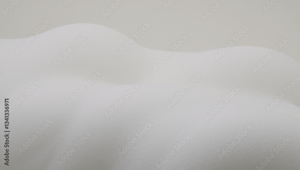 Fototapeta premium An abstract image featuring a white soap-like foam texture filled with swirling bubbles to represent shampoo foam