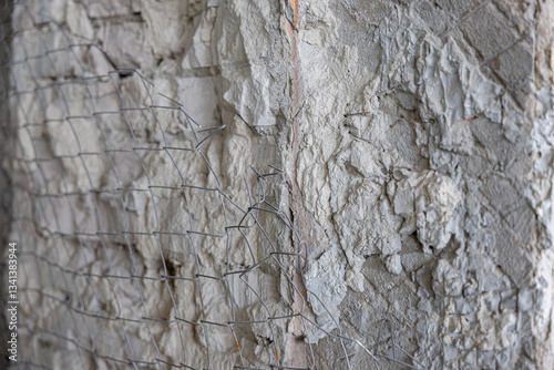 Old exterior brick wall. Old destroyed wall structure in vintage style. Abstract background texture texture. Old exterior wall. Abstract wall with painted grunge background.