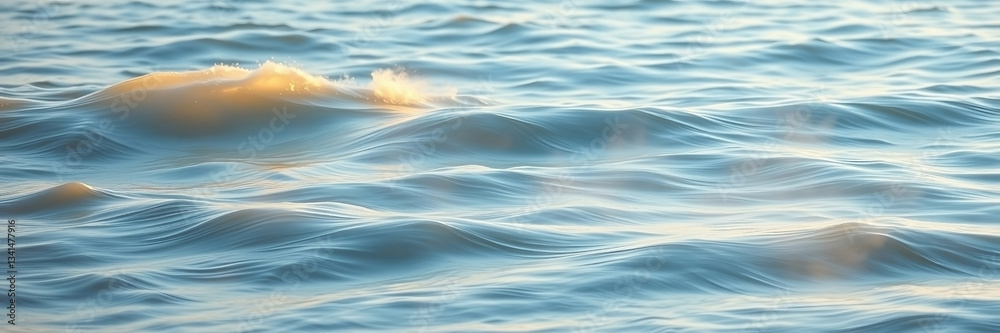 Obraz premium Calm Blue Ocean Waves Texture Background with Soft Sunlight Reflections