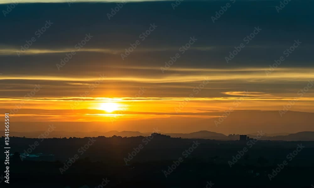 Golden Sunset Cityscape: Dark Clouds and Orange Hues Golden Sunset Cityscape: Dark Clouds and Orange Hues