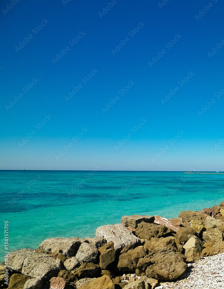 Breakwater on beach in Vada, Italy. Breakwater on beach in Vada, Italy.