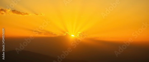 Golden sun rays breaking over a horizon, symbolizing enlightenment, growth, sagacity