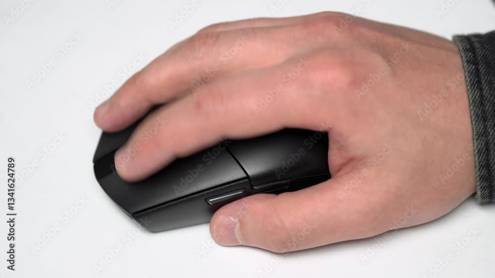 click on a computer mouse. Click black computer mouse on a work desk. Working with a PC or laptop at workplace, close-up
click on a computer mouse. Click black computer mouse on a work desk. Working with a PC or laptop at workplace, close-up