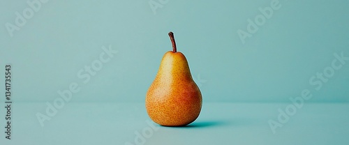 Single Pear Against Teal Background