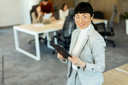 Asian businesswoman engaged...