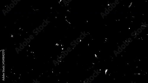 Old film effect showing dust and scratches on black background
