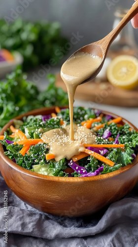Creamy tahini kale salad with vibrant vegetables and a nourishing dressing