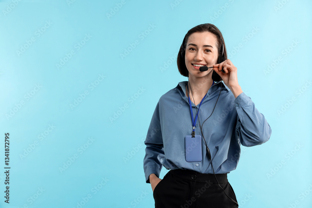 Technical support call center. Smiling operator on light blue background. Space for text Technical support call center. Smiling operator on light blue background. Space for text