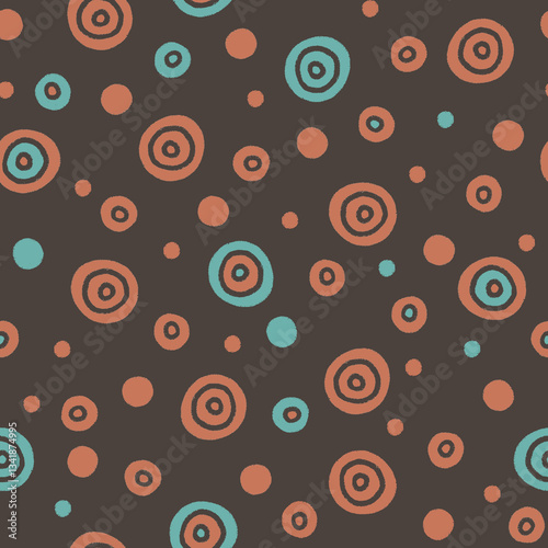 Seamless orange and blue pattern of hand-drawn marker centric circles, balls and dots on a brown background