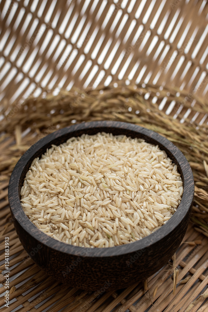 unhulled asian brown rice grains in rustic setting display in Cambodia unhulled asian brown rice grains in rustic setting display in Cambodia